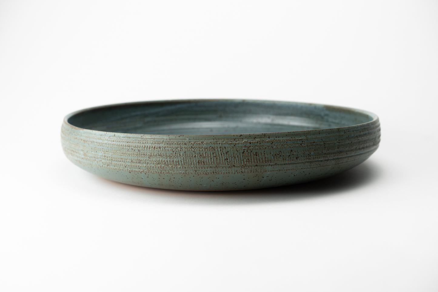 Large hand-thrown serving bowl by MK Clayworks in Brevard, NC – modern, minimalist pottery designed for sharing meals.