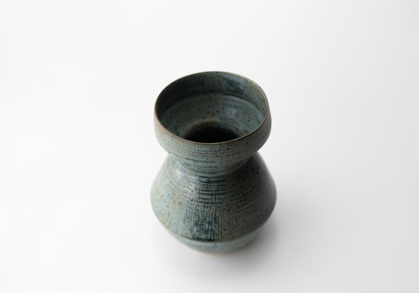 Handmade ceramic vase by MK Clayworks in Brevard, NC – one-of-a-kind pottery inspired by organic forms and natural textures.