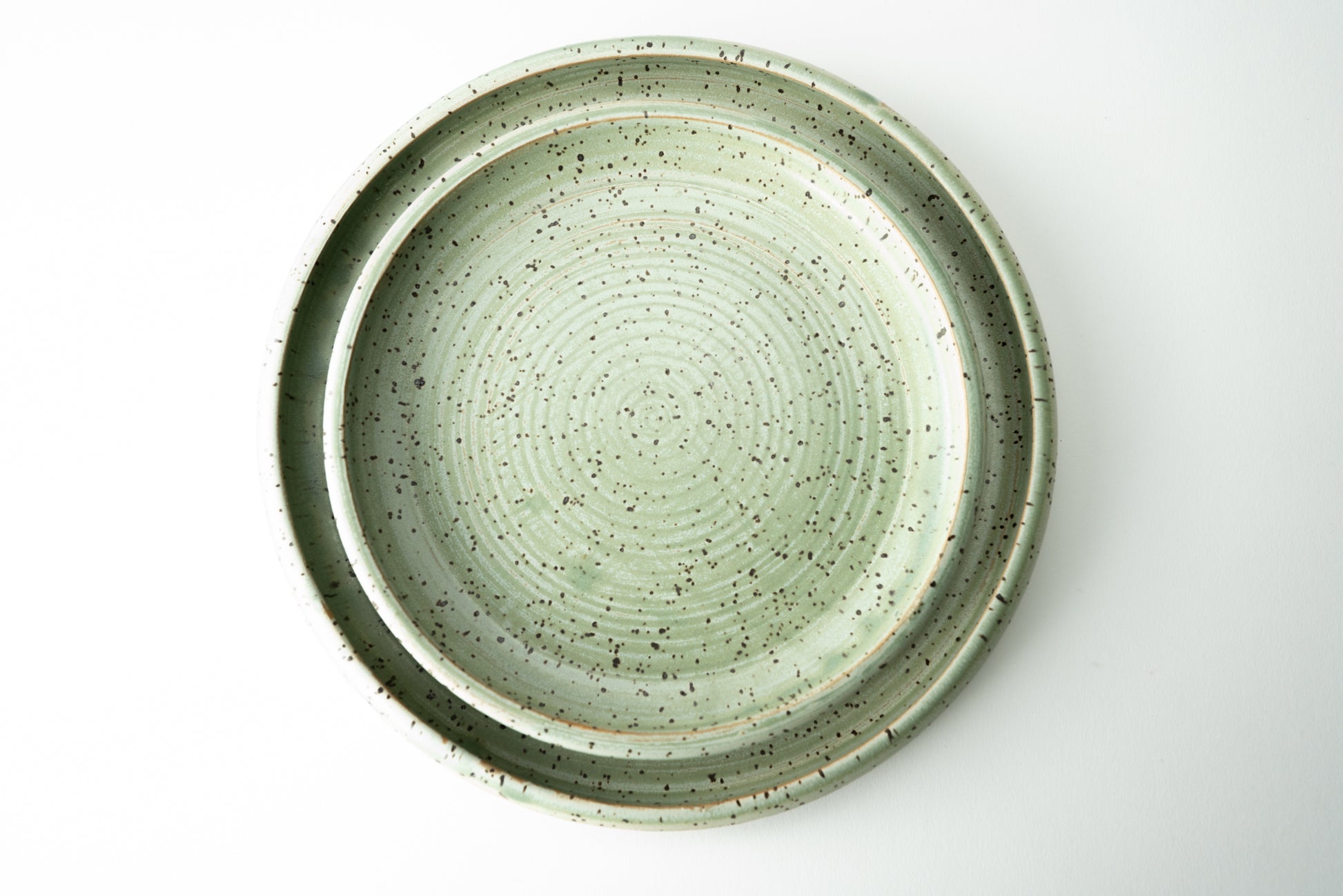 Handmade ceramic plate by MK Clayworks in Brevard, NC – minimalist, functional pottery crafted for everyday dining.