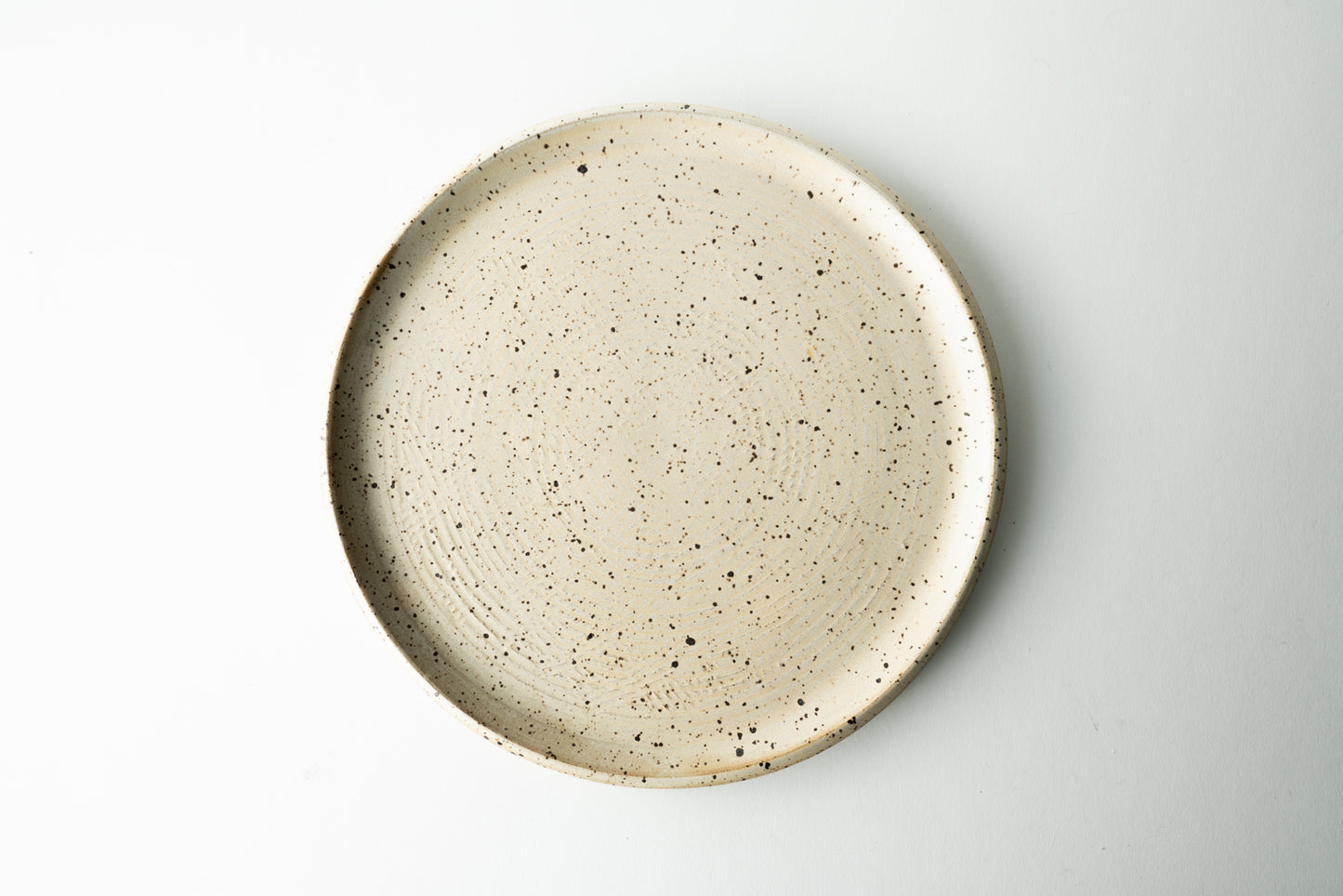 Handmade ceramic plate by MK Clayworks in Brevard, NC – minimalist, functional pottery crafted for everyday dining.