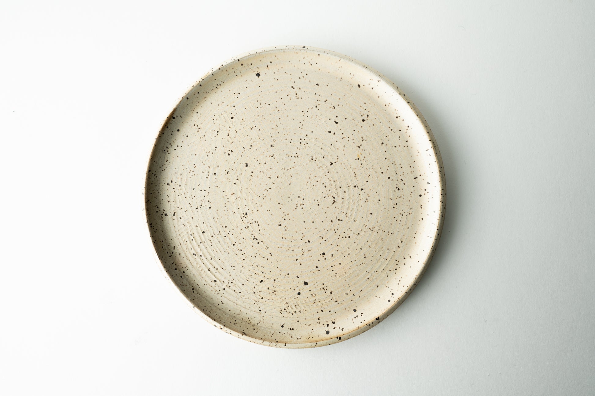 Handmade ceramic plate by MK Clayworks in Brevard, NC – minimalist, functional pottery crafted for everyday dining.