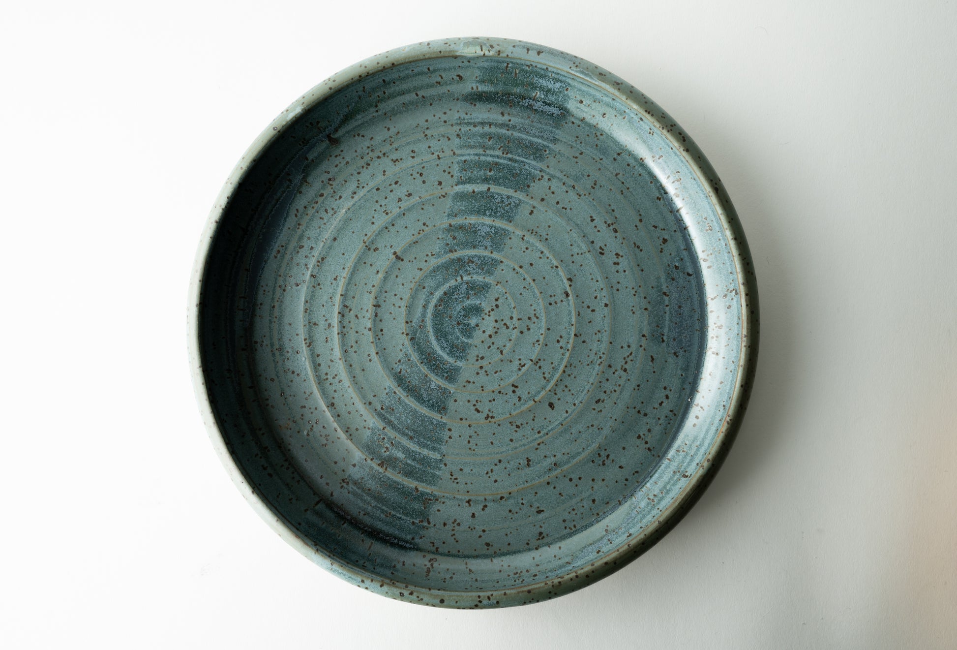 Handmade ceramic plate by MK Clayworks in Brevard, NC – minimalist, functional pottery crafted for everyday dining.