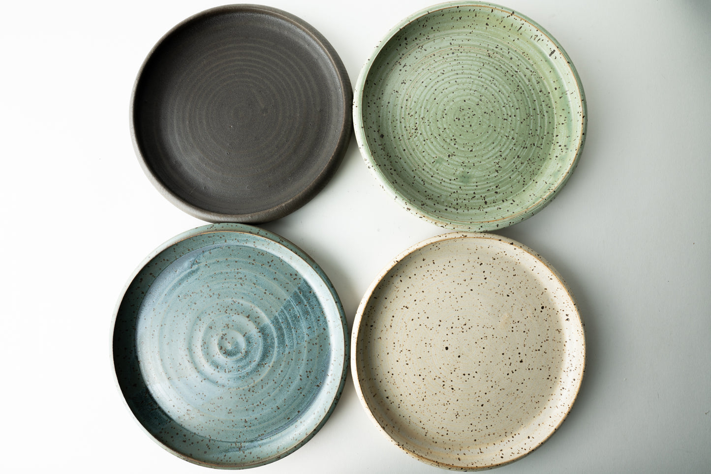 Handmade ceramic plate by MK Clayworks in Brevard, NC – minimalist, functional pottery crafted for everyday dining.