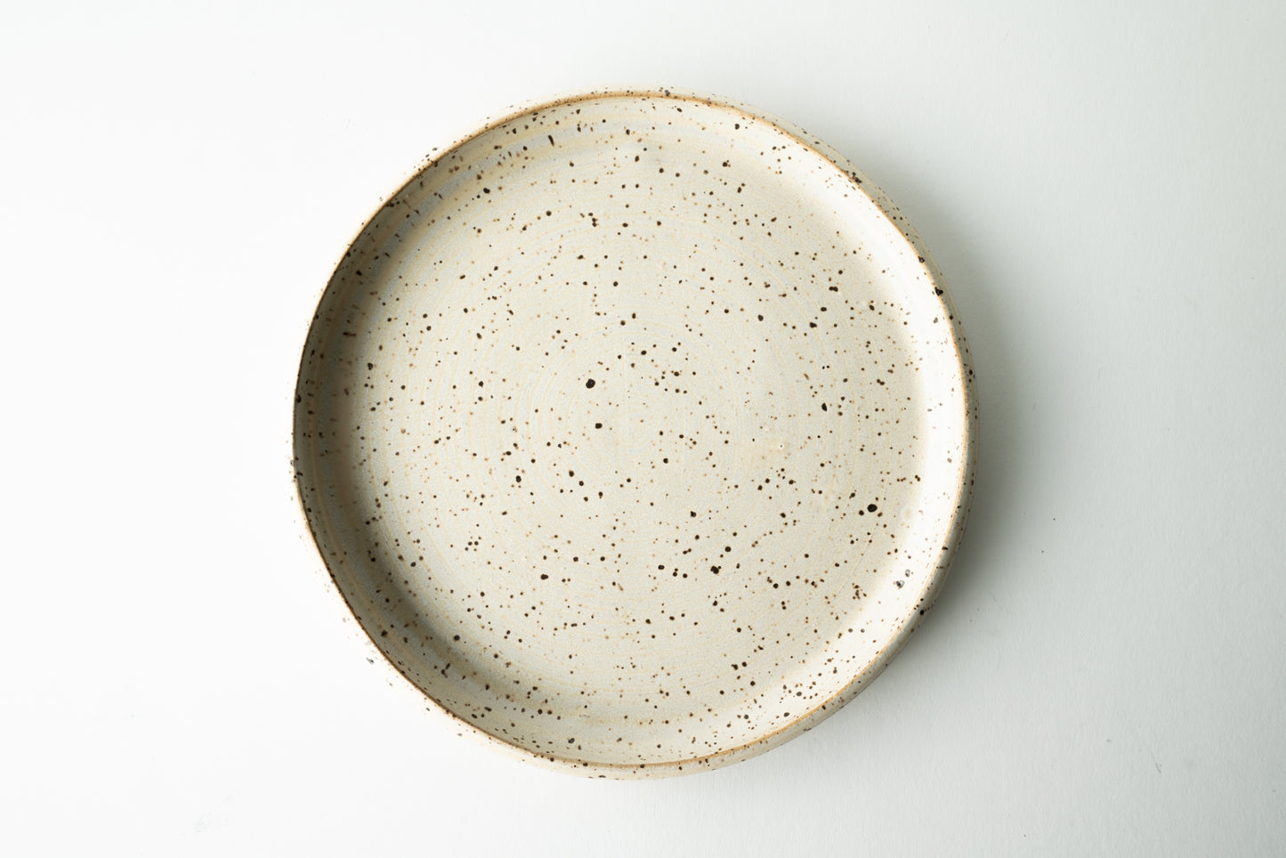 Handmade ceramic plate by MK Clayworks in Brevard, NC – minimalist, functional pottery crafted for everyday dining.