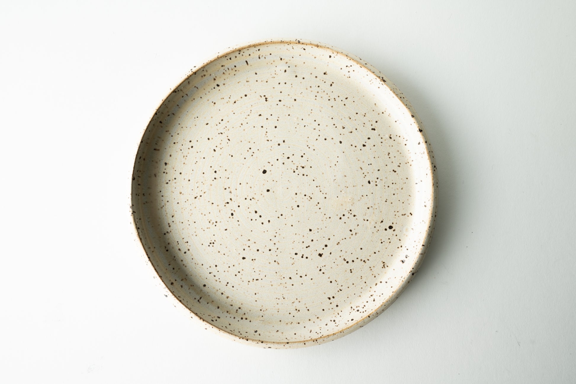 Handmade ceramic plate by MK Clayworks in Brevard, NC – minimalist, functional pottery crafted for everyday dining.