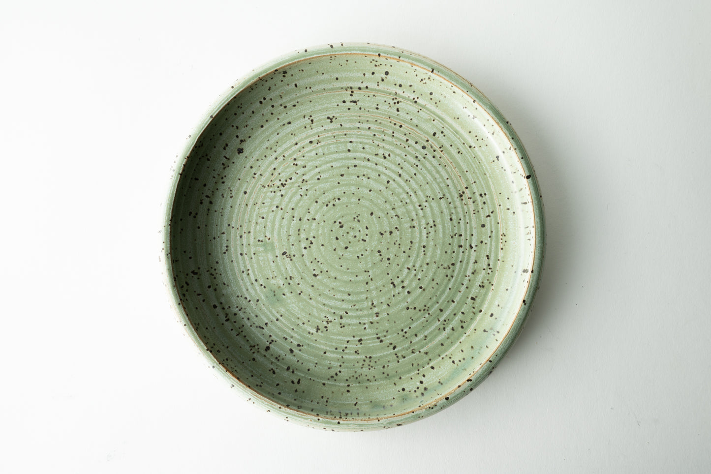 Handmade ceramic plate by MK Clayworks in Brevard, NC – minimalist, functional pottery crafted for everyday dining.