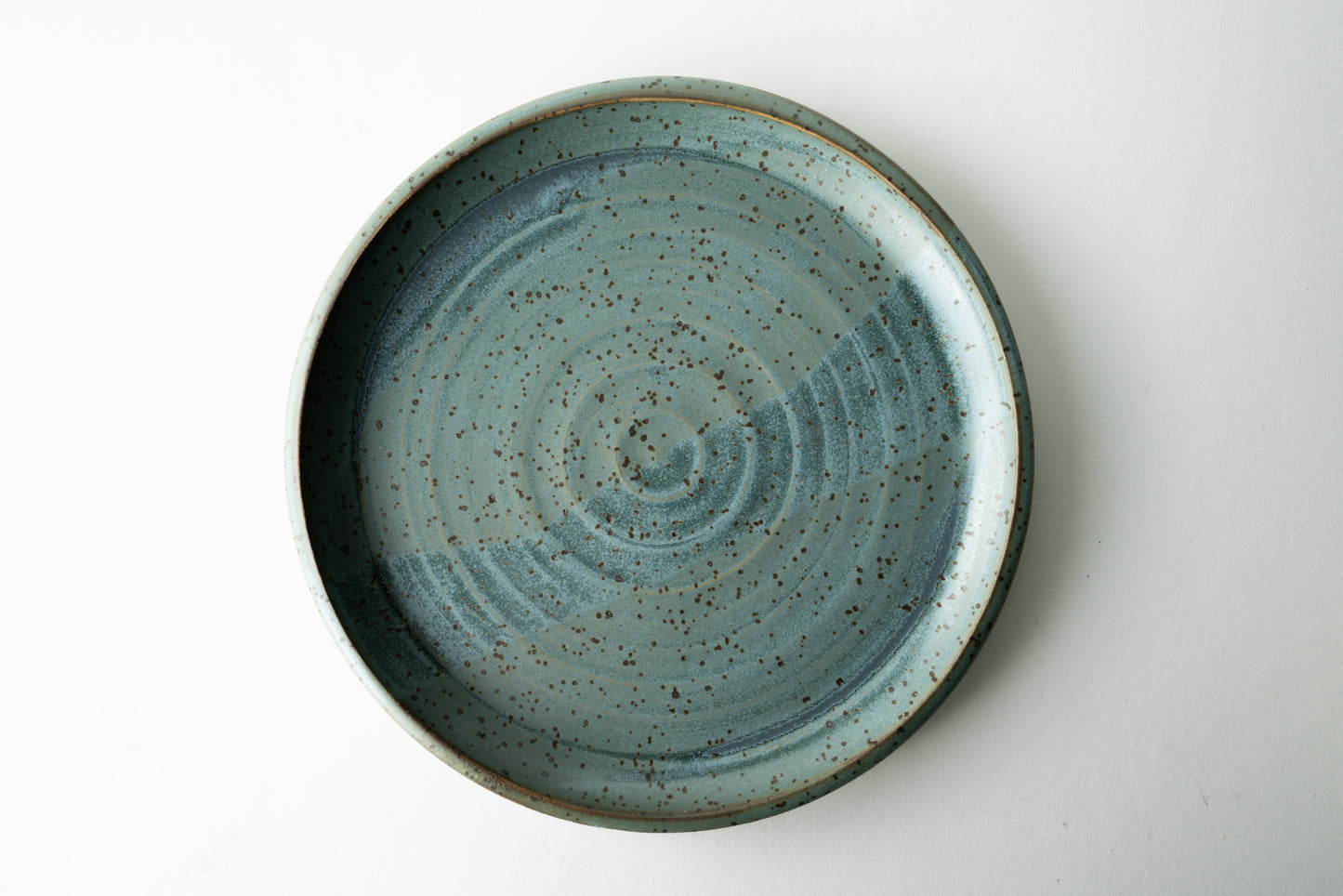 Handmade ceramic plate by MK Clayworks in Brevard, NC – minimalist, functional pottery crafted for everyday dining.