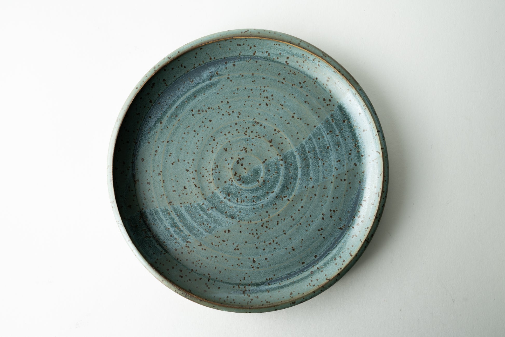 Handmade ceramic plate by MK Clayworks in Brevard, NC – minimalist, functional pottery crafted for everyday dining.