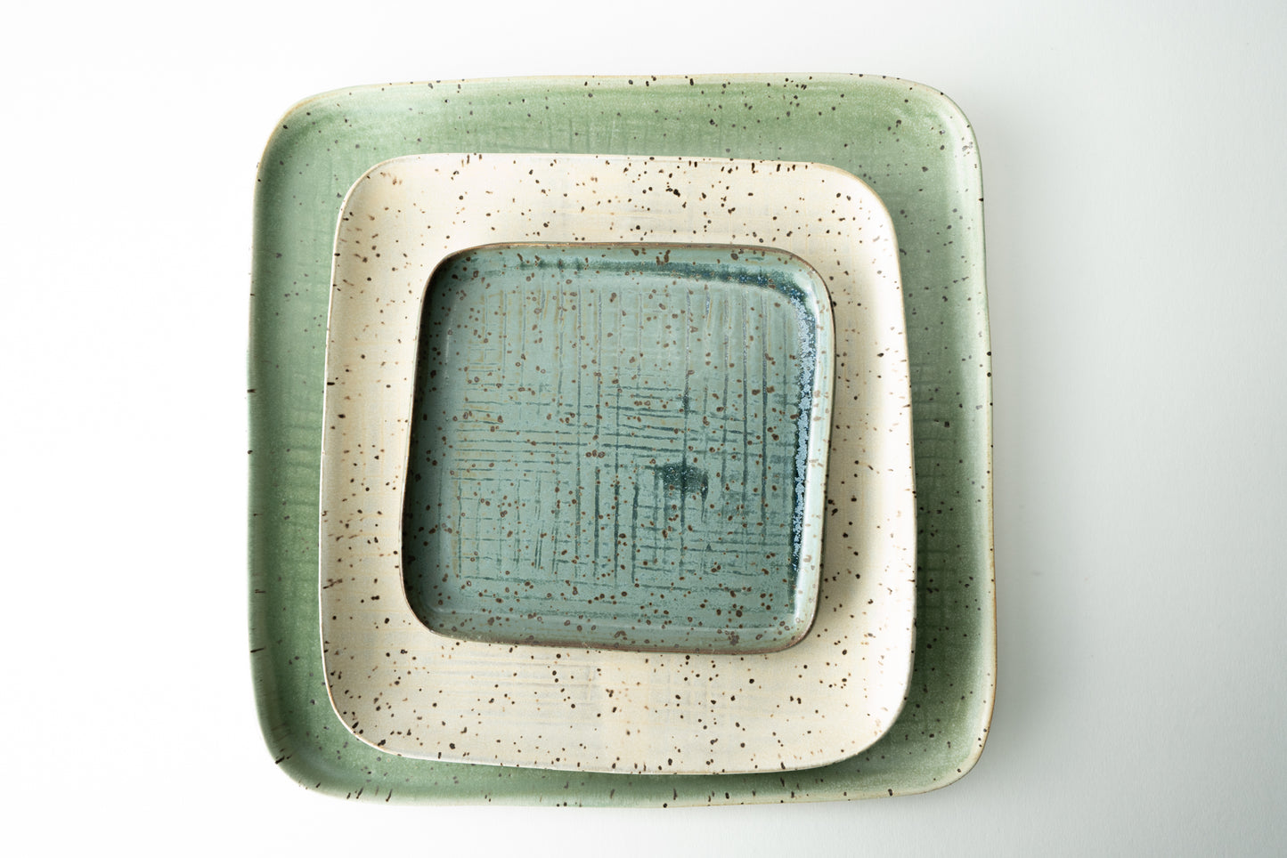 Handmade ceramic plate by MK Clayworks in Brevard, NC – minimalist, functional pottery crafted for everyday dining.