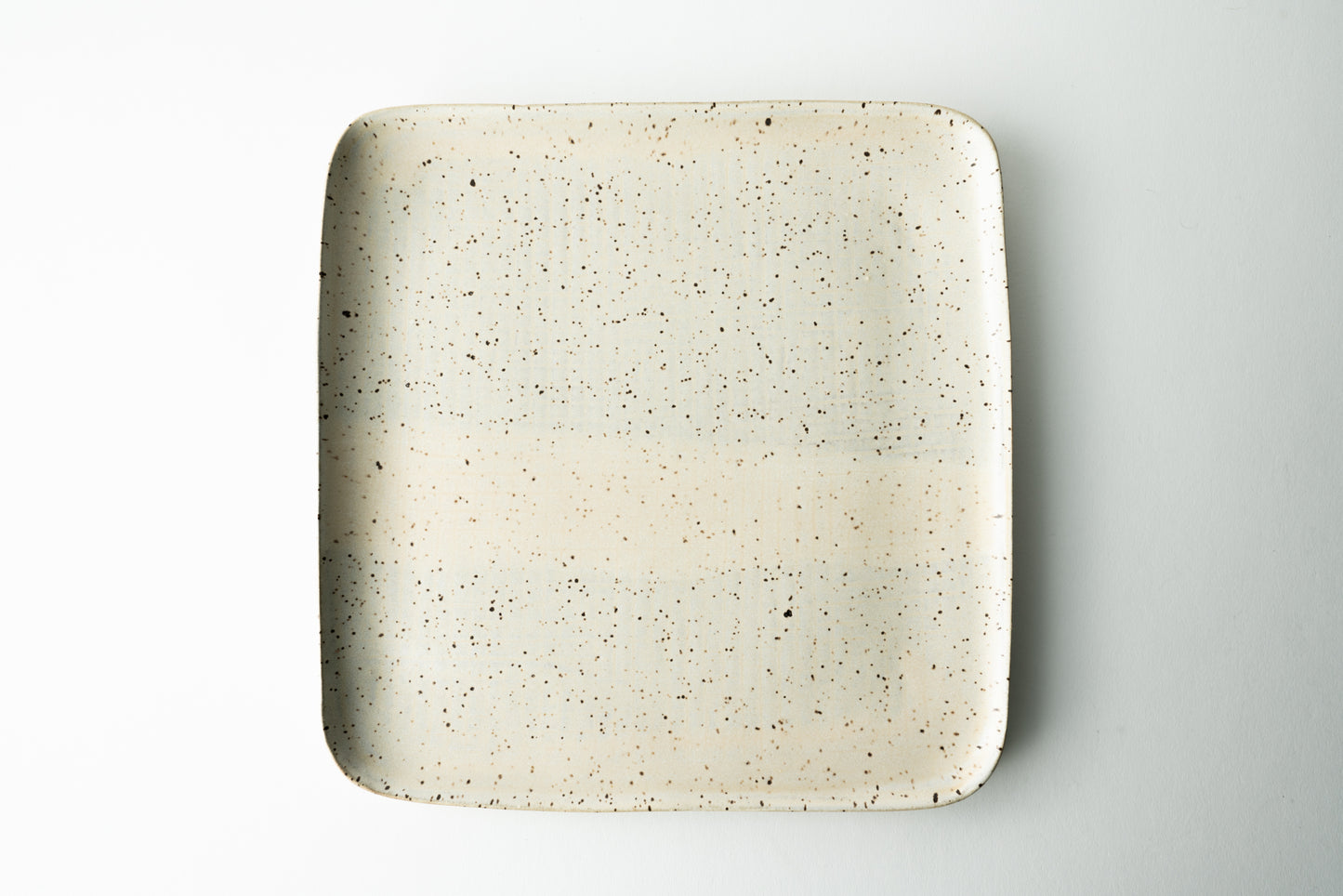 Handmade ceramic plate by MK Clayworks in Brevard, NC – minimalist, functional pottery crafted for everyday dining.