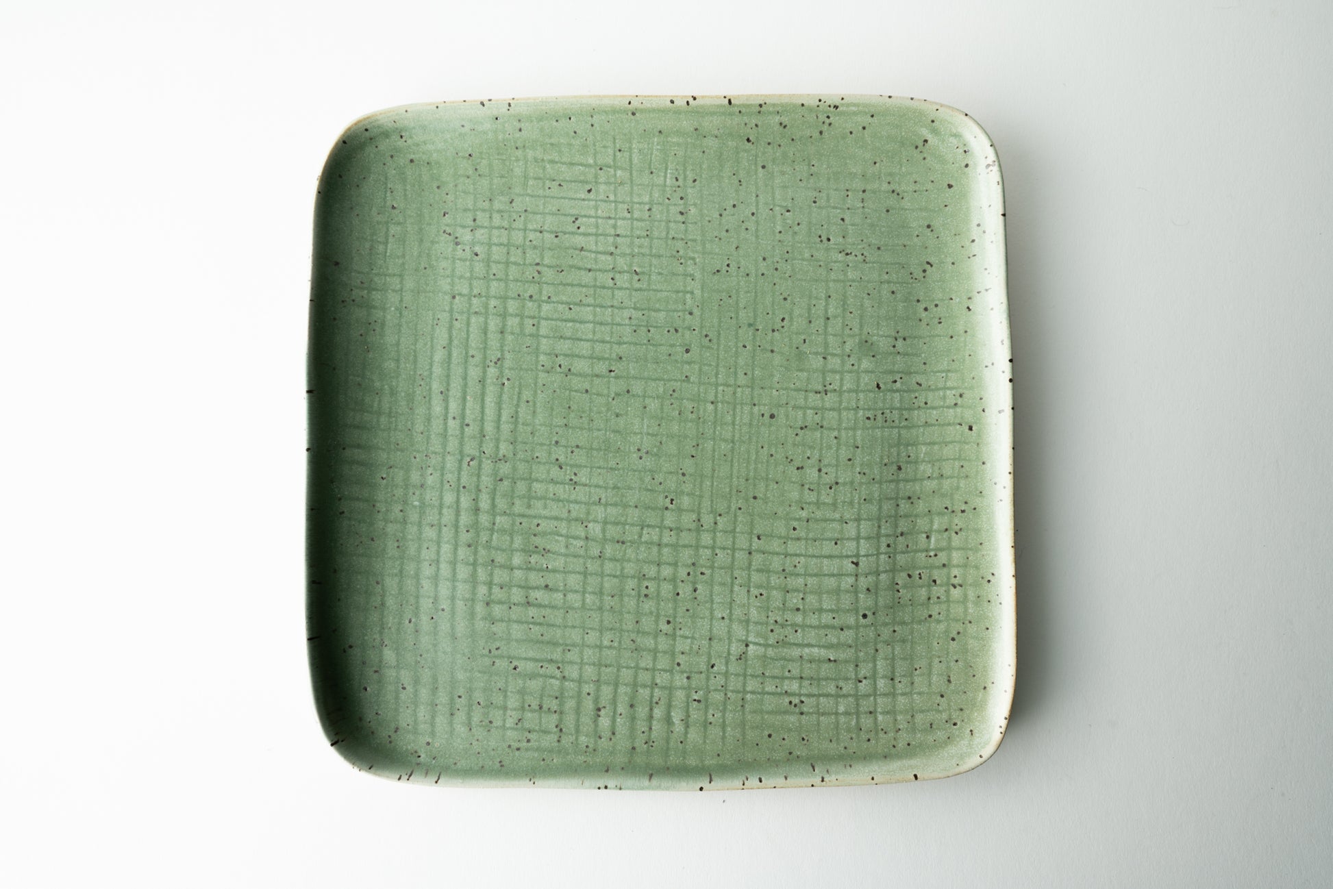 Handmade ceramic plate by MK Clayworks in Brevard, NC – minimalist, functional pottery crafted for everyday dining.