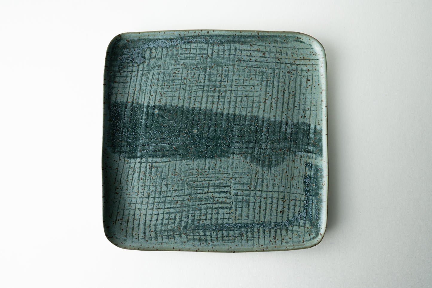 Handmade ceramic plate by MK Clayworks in Brevard, NC – minimalist, functional pottery crafted for everyday dining.