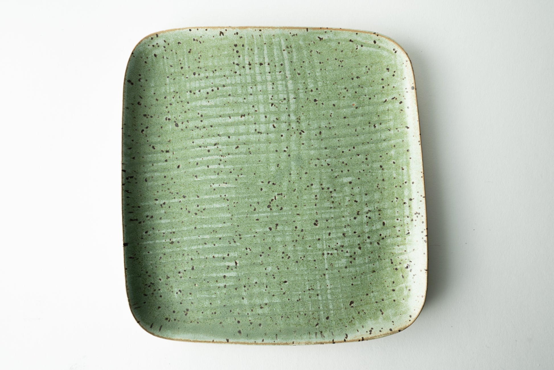 Handmade ceramic plate by MK Clayworks in Brevard, NC – minimalist, functional pottery crafted for everyday dining.
