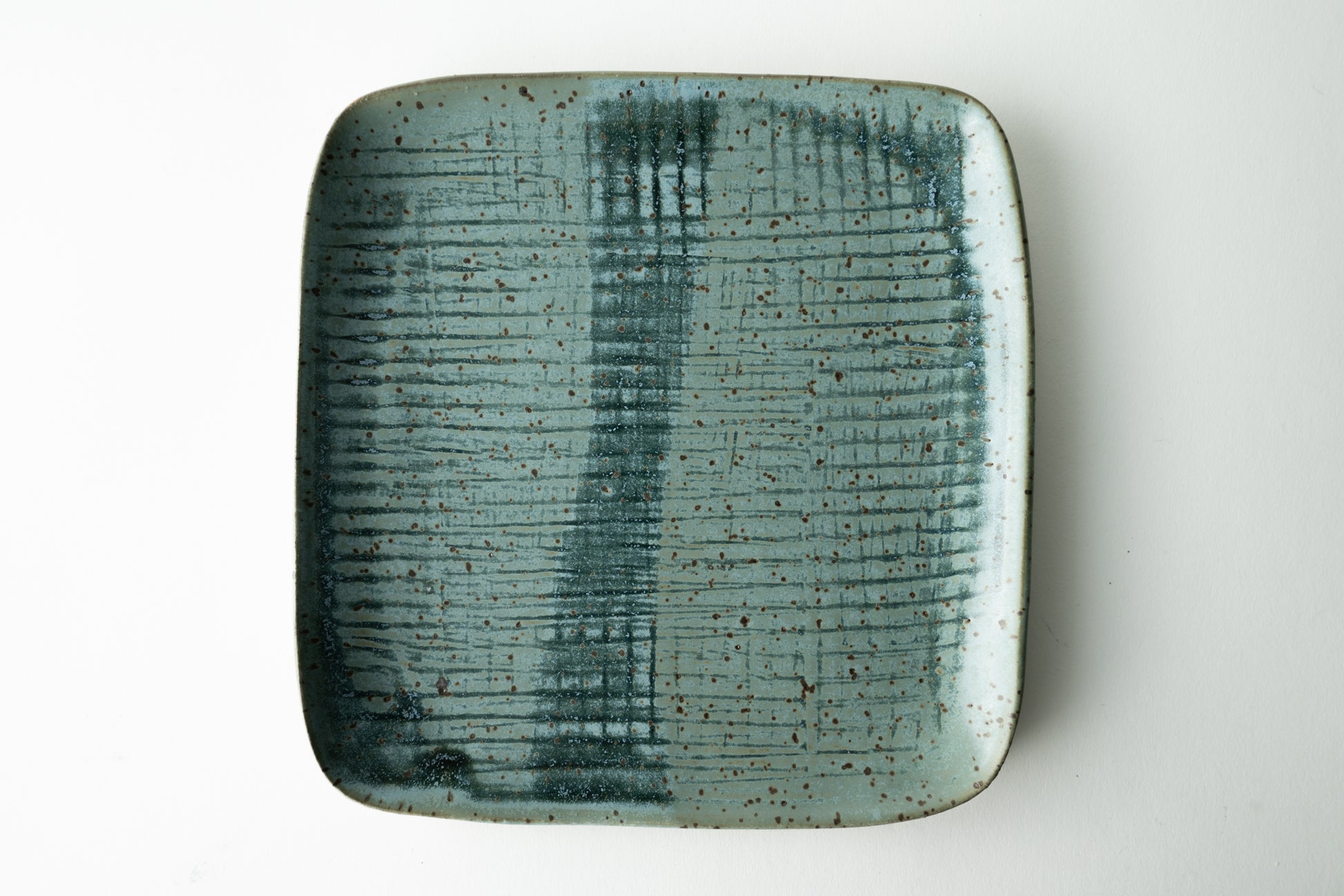 Handmade ceramic plate by MK Clayworks in Brevard, NC – minimalist, functional pottery crafted for everyday dining.