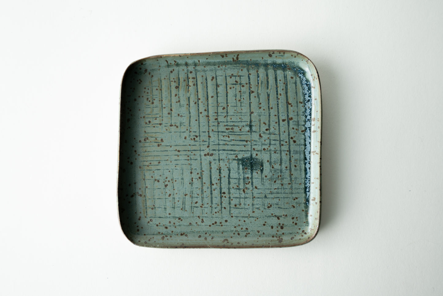 Handmade ceramic plate by MK Clayworks in Brevard, NC – minimalist, functional pottery crafted for everyday dining.