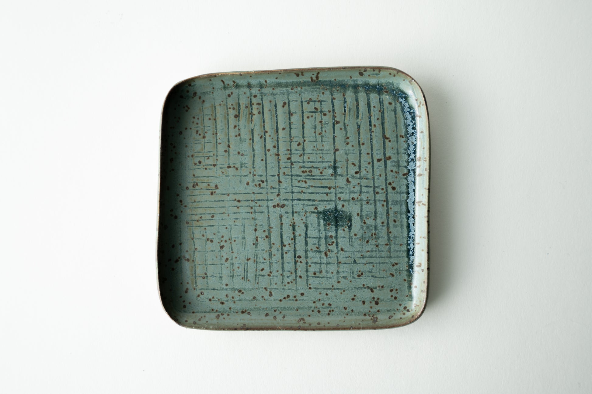 Handmade ceramic plate by MK Clayworks in Brevard, NC – minimalist, functional pottery crafted for everyday dining.