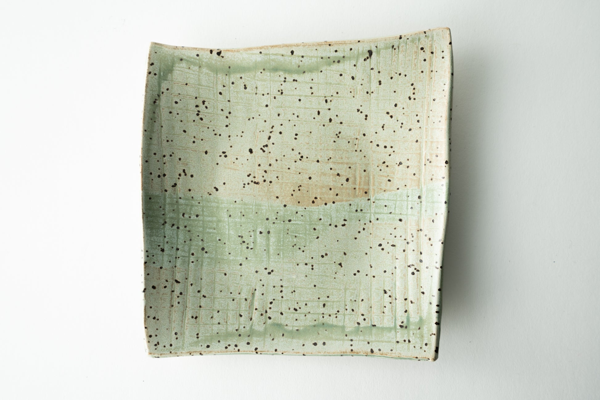 Handmade ceramic plate by MK Clayworks in Brevard, NC – minimalist, functional pottery crafted for everyday dining.