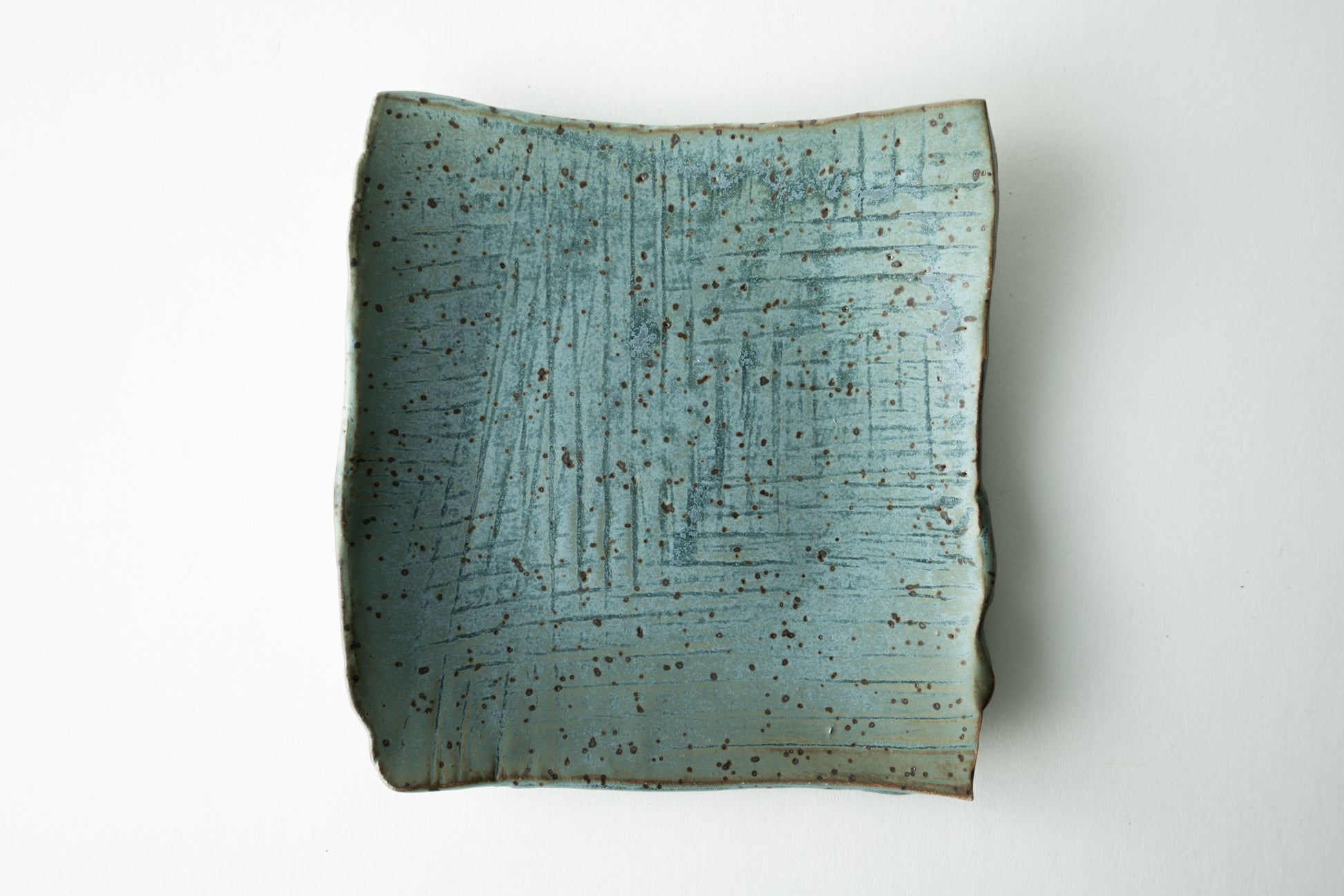 Handmade ceramic plate by MK Clayworks in Brevard, NC – minimalist, functional pottery crafted for everyday dining.