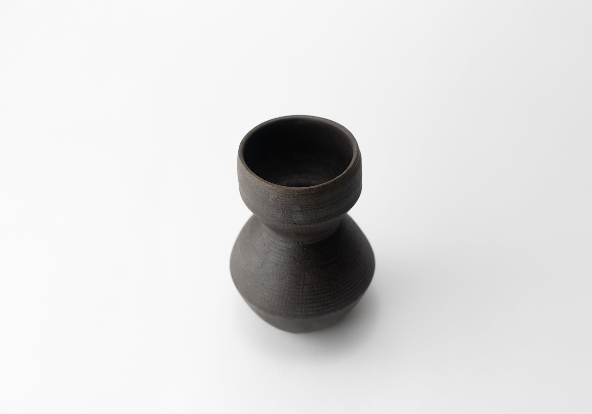 Handmade ceramic vase by MK Clayworks in Brevard, NC – one-of-a-kind pottery inspired by organic forms and natural textures.