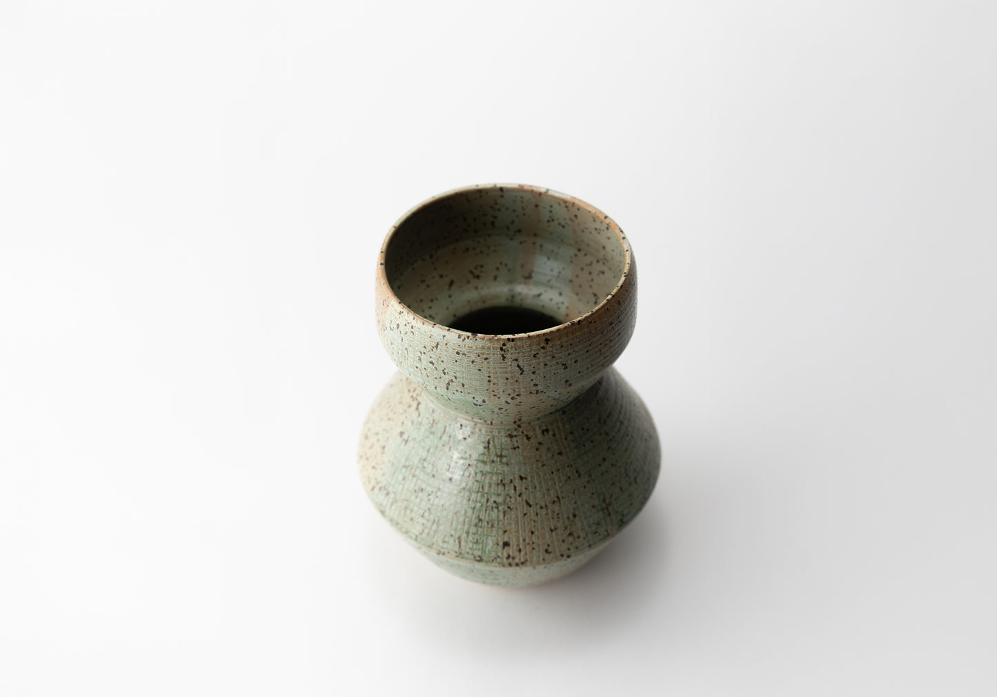 Handmade ceramic vase by MK Clayworks in Brevard, NC – one-of-a-kind pottery inspired by organic forms and natural textures.