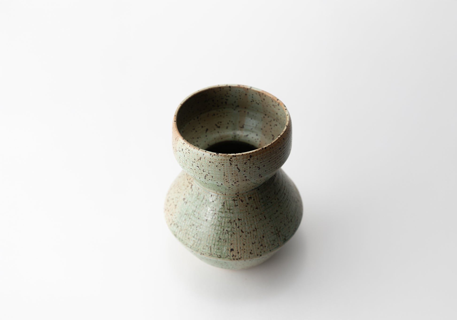 Handmade ceramic vase by MK Clayworks in Brevard, NC – one-of-a-kind pottery inspired by organic forms and natural textures.
