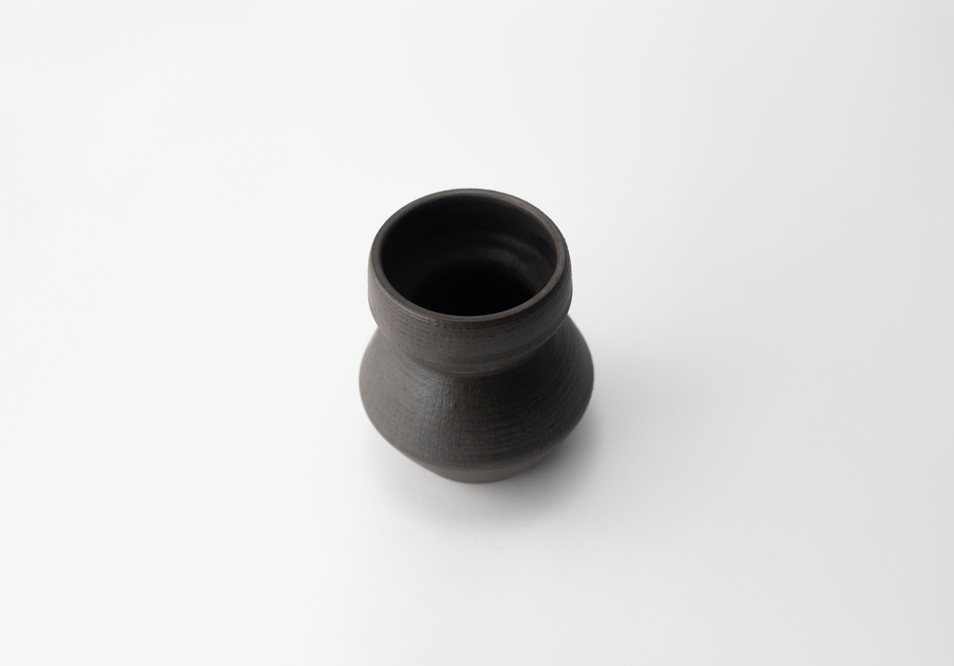 Handmade ceramic vase by MK Clayworks in Brevard, NC – one-of-a-kind pottery inspired by organic forms and natural textures.