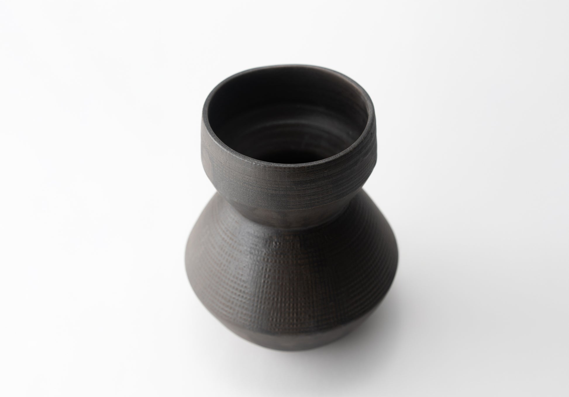 Handmade ceramic vase by MK Clayworks in Brevard, NC – one-of-a-kind pottery inspired by organic forms and natural textures.